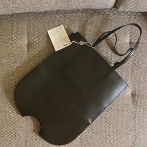 Off - white new handbag black color